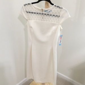 Ivory bodycon dress. Never Worn. NWT